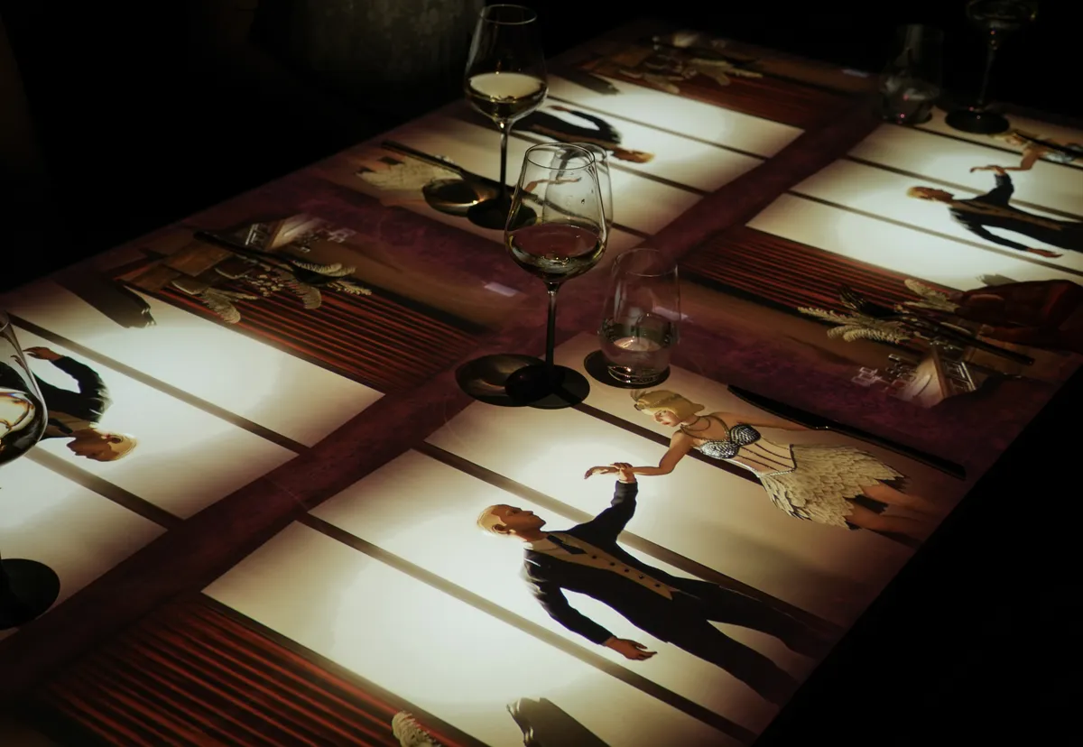 Projected scenes across the entire table